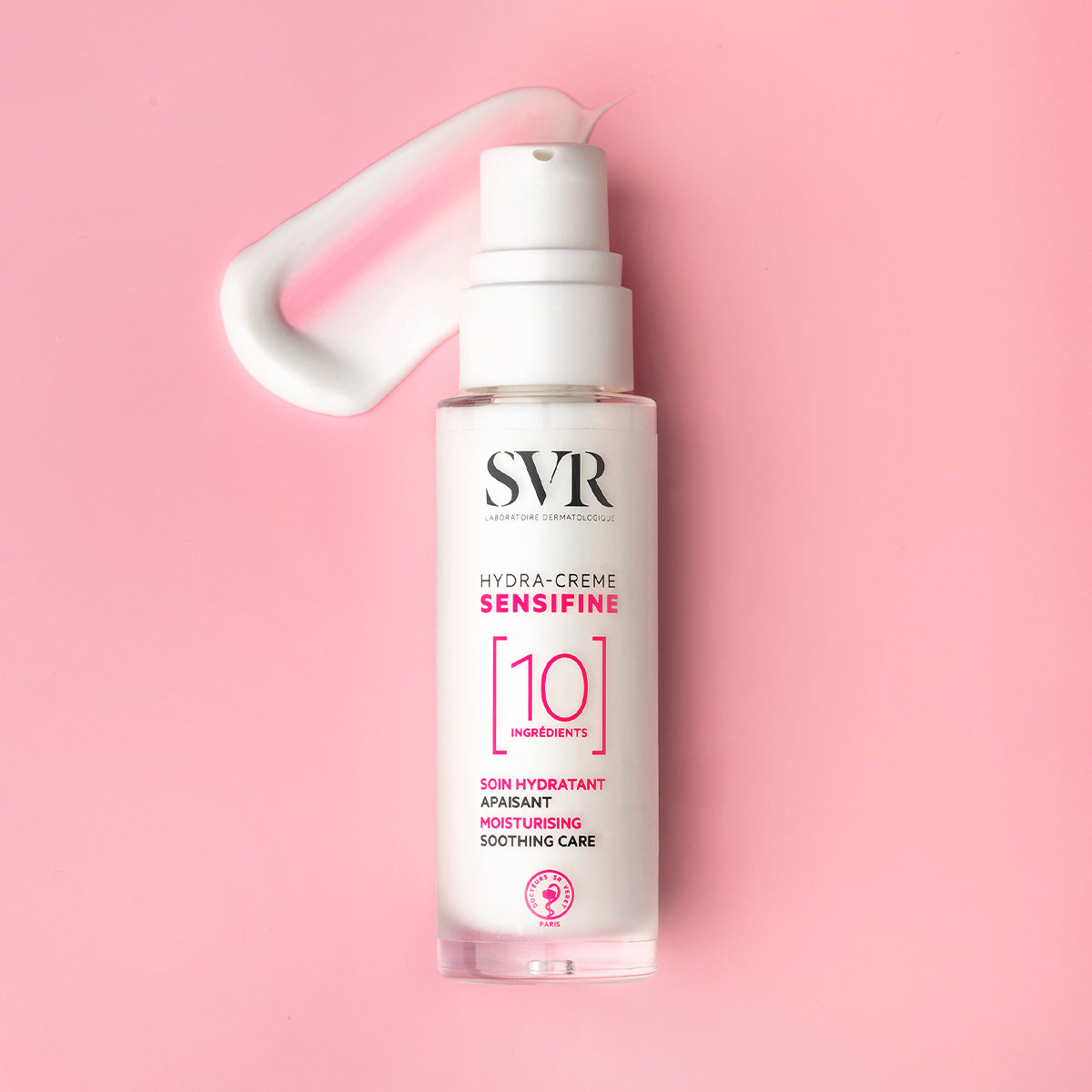 SVR Sensifine Hydra-Crème pump bottle with a white cream smear on a soft pink background.