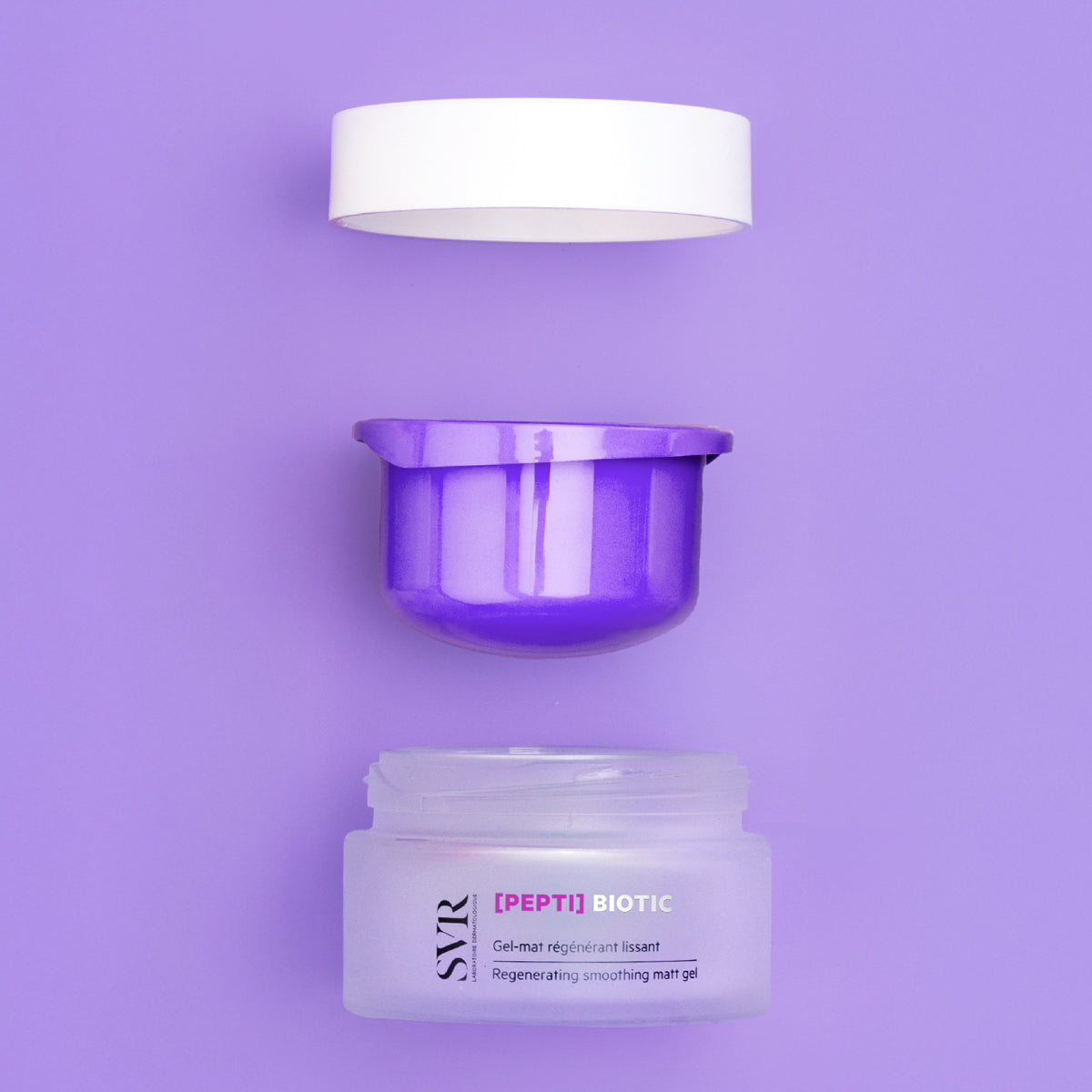 SVR PEPTI Biotic regenerating smoothing matt gel in a frosted glass jar with a purple inner container and white lid.