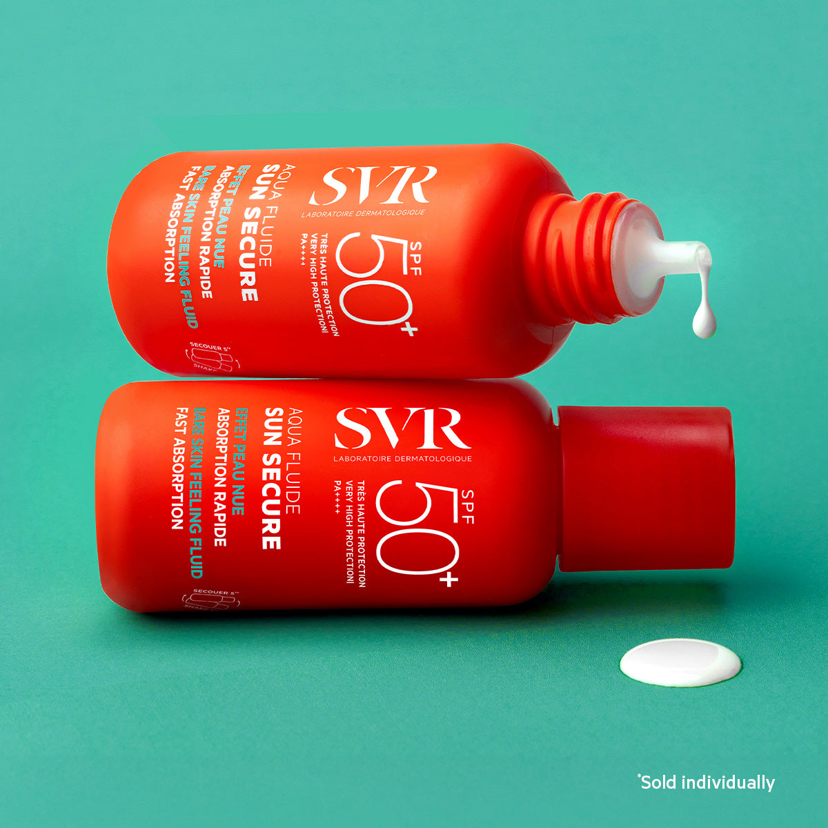 Two orange SVR SUN SECURE Aqua Fluide SPF50+ bottles on a teal background with a drop of white sunscreen fluid.
